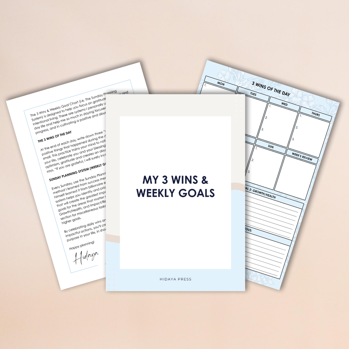 Three sheets of paper with different printables on a beige background